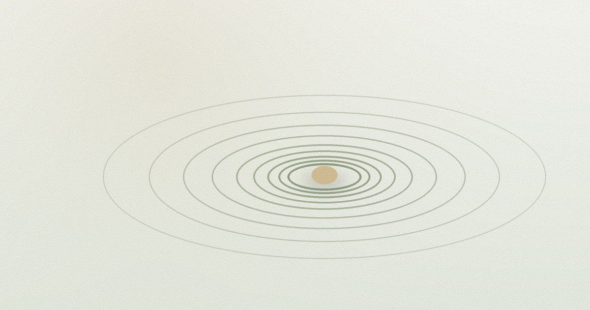 Calm ripples spreading in circles from a single point.